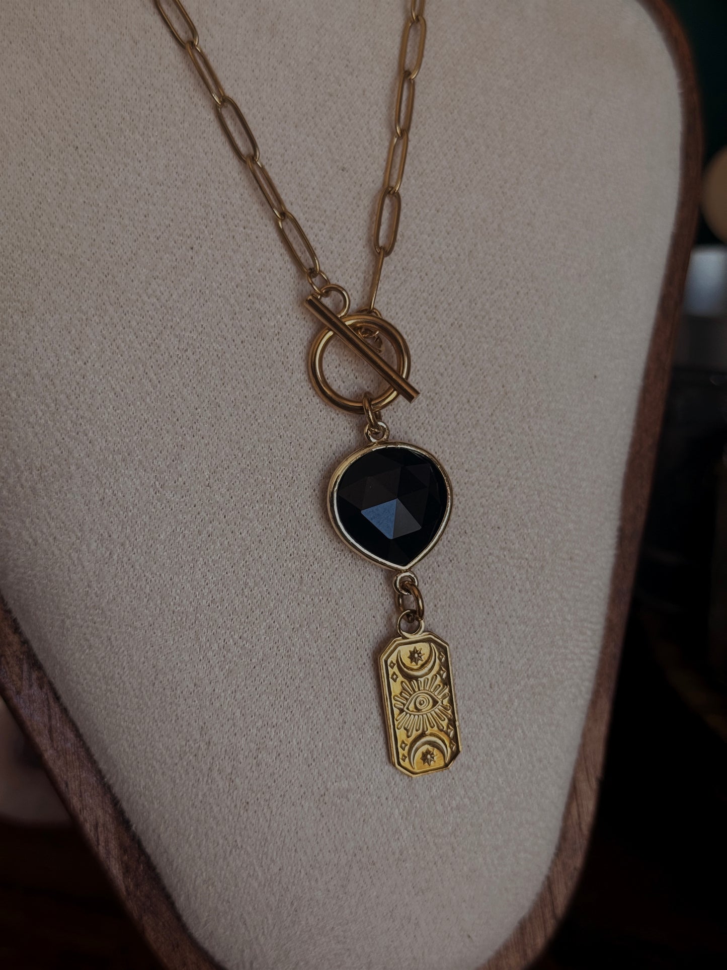 Goldene Obsidian Kette mit Mondsymbolen und schützendem Auge aus Edelstahl und Messing

